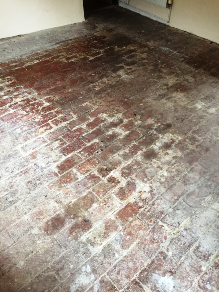 100 Year Old Brick Floor Before Cleaning